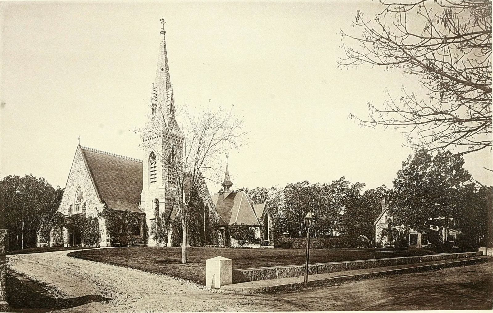 A stone church with a tall spire in North Easton village, from an 1886 history of Easton